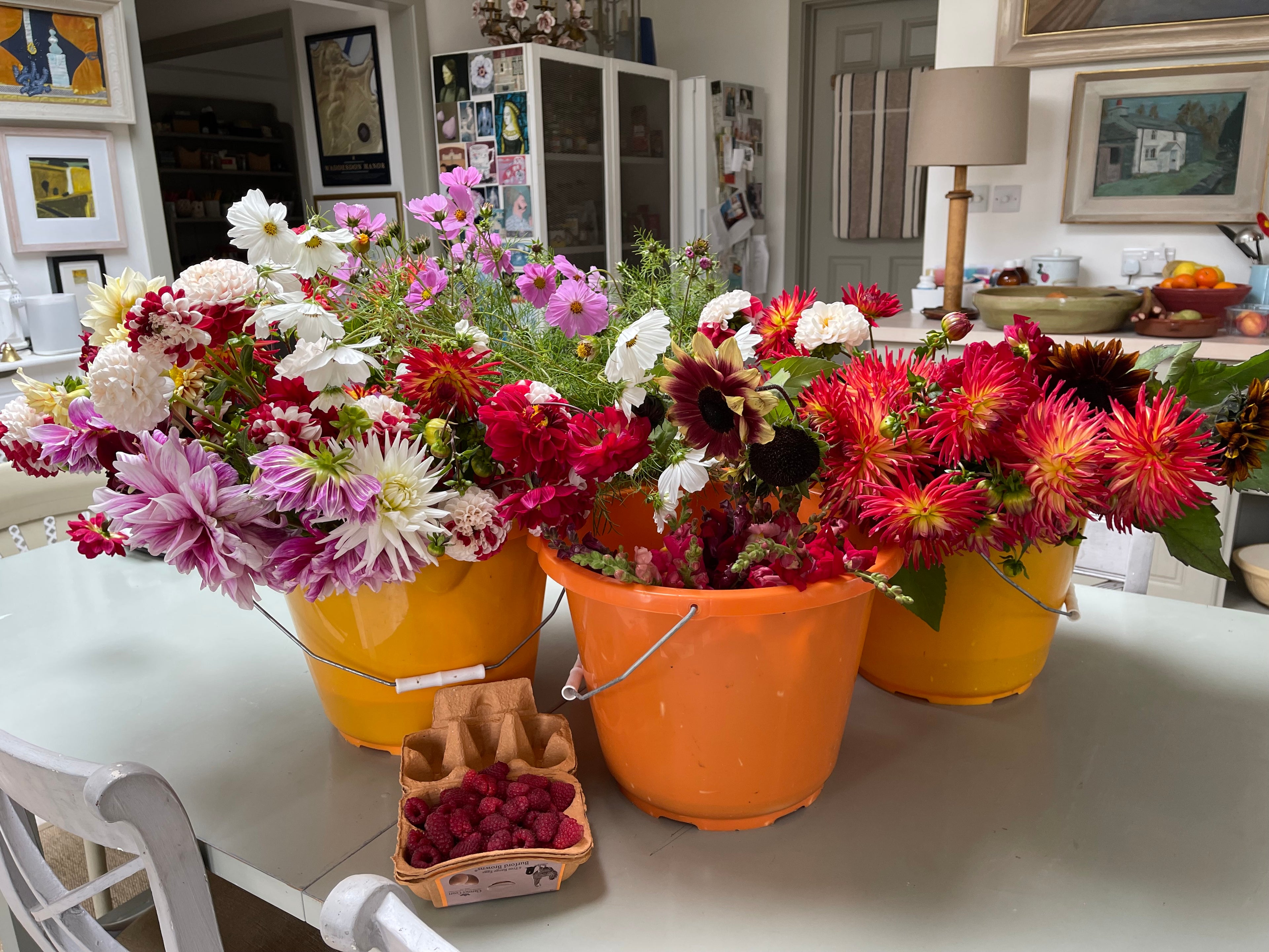 Photograph of buckets of flowers grown by Sara Sweetland in her allotment.